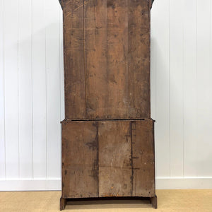 A 19th Century English Pine Ebonized Linen Press Cupboard