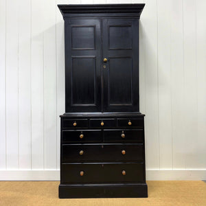 A 19th Century English Pine Ebonized Linen Press Cupboard