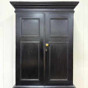 A 19th Century English Pine Ebonized Linen Press Cupboard
