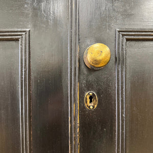 A 19th Century English Pine Ebonized Linen Press Cupboard