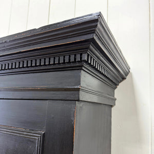 A 19th Century English Pine Ebonized Linen Press Cupboard