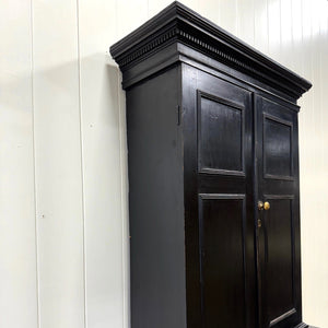 A 19th Century English Pine Ebonized Linen Press Cupboard