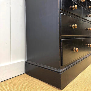 A 19th Century English Pine Ebonized Linen Press Cupboard
