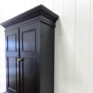 A 19th Century English Pine Ebonized Linen Press Cupboard