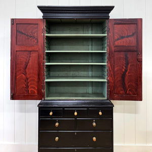 A 19th Century English Pine Ebonized Linen Press Cupboard