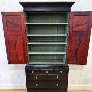 A 19th Century English Pine Ebonized Linen Press Cupboard