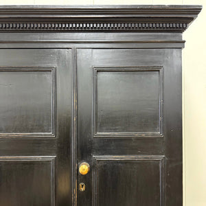 A 19th Century English Pine Ebonized Linen Press Cupboard
