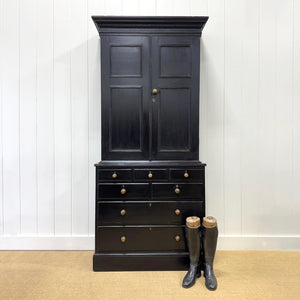 A 19th Century English Pine Ebonized Linen Press Cupboard