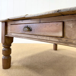 An Antique Rustic English Country Pine Scrubbed Top Coffee Table