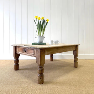 An Antique Rustic English Country Pine Scrubbed Top Coffee Table
