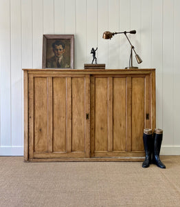 An English 19th Century Pitch Pine Sliding Door Bookcase