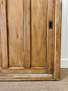 An English 19th Century Pitch Pine Sliding Door Bookcase