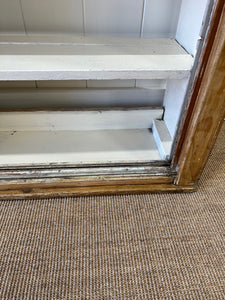 An English 19th Century Pitch Pine Sliding Door Bookcase