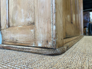 An English 19th Century Pitch Pine Sliding Door Bookcase
