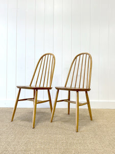 A Pair of Oak Ercol Chairs