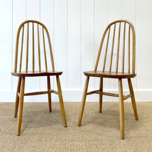 A Pair of Oak Ercol Chairs