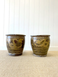 A Pair of Antique Chinese Garden Pots with Dragon Motif
