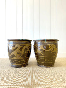 A Pair of Antique Chinese Garden Pots with Dragon Motif