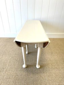 An Antique Pine Oval Drop Leaf Coffee Table