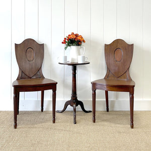 A Pair of Regency Fluted Leg Hall Chairs