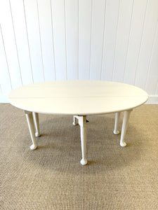 An Antique Pine Oval Drop Leaf Coffee Table