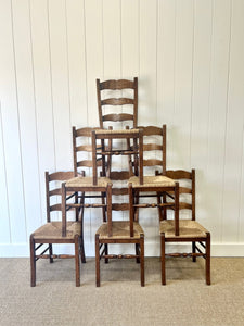 A Set of 6 Vintage Country English Oak Dining Chairs With Rush Seats