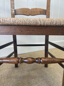 A Set of 6 Vintage Country English Oak Dining Chairs With Rush Seats