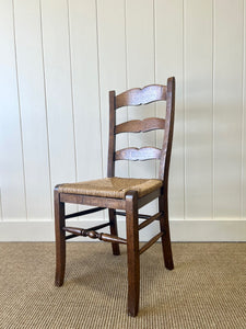 A Set of 6 Vintage Country English Oak Dining Chairs With Rush Seats
