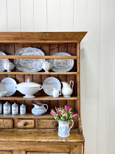 An Early 19th Century Pine Irish Dresser or Cupboard with Wooden Knobs