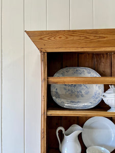 An Early 19th Century Pine Irish Dresser or Cupboard with Wooden Knobs