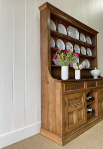 An Early 19th century Rustic Pine Welsh Dresser or Cupboard with Brass Hardware