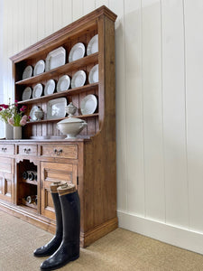 An Early 19th century Rustic Pine Welsh Dresser or Cupboard with Brass Hardware