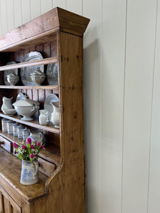 An Early 19th Century Pine Irish Dresser or Cupboard with Wooden Knobs
