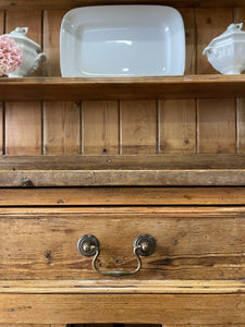 An Early 19th century Rustic Pine Welsh Dresser or Cupboard with Brass Hardware