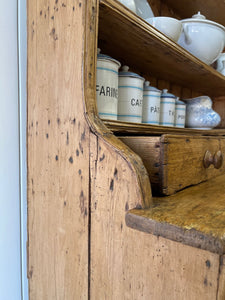 An Early 19th Century Pine Irish Dresser or Cupboard with Wooden Knobs