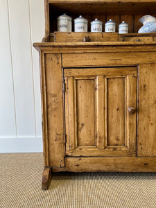 An Early 19th Century Pine Irish Dresser or Cupboard with Wooden Knobs