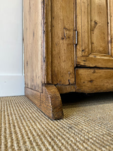 An Early 19th Century Pine Irish Dresser or Cupboard with Wooden Knobs