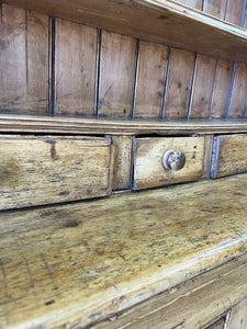 An Early 19th Century Pine Irish Dresser or Cupboard with Wooden Knobs