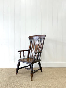 A 19th Century High Back Armchair
