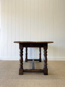 An Antique English Country Oak 5.5 ft Kitchen Dining Table c1820 with Turned Legs