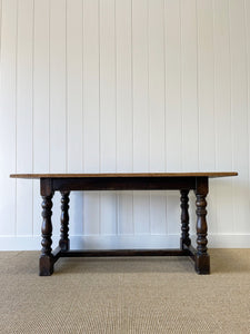 An Antique English Country Oak 5.5 ft Kitchen Dining Table c1820 with Turned Legs