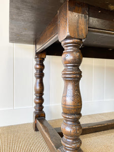 An Antique English Country Oak 5.5 ft Kitchen Dining Table c1820 with Turned Legs