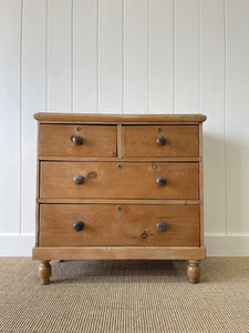 An Antique English Pine Chest of Drawers Dresser with Dark Wooden Knobs c1890