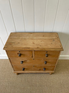 An Antique English Pine Chest of Drawers Dresser with Dark Wooden Knobs c1890