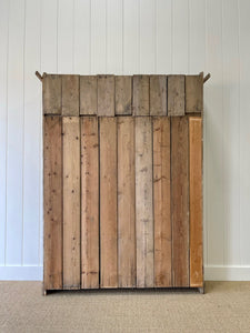 A 19th Century English Pine Livery or Coat Cupboard