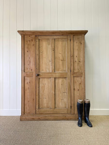 A 19th Century English Pine Livery or Coat Cupboard
