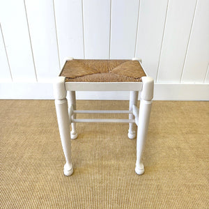 A Painted Stool with Rush Seat and Spoon Feet