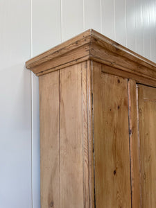 A 19th Century English Pine Livery or Coat Cupboard