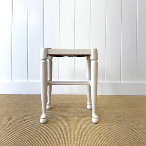 A Painted Stool with Rush Seat and Spoon Feet