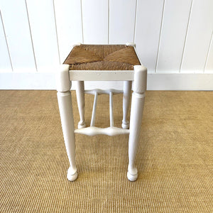 A Painted Stool with Rush Seat and Spoon Feet